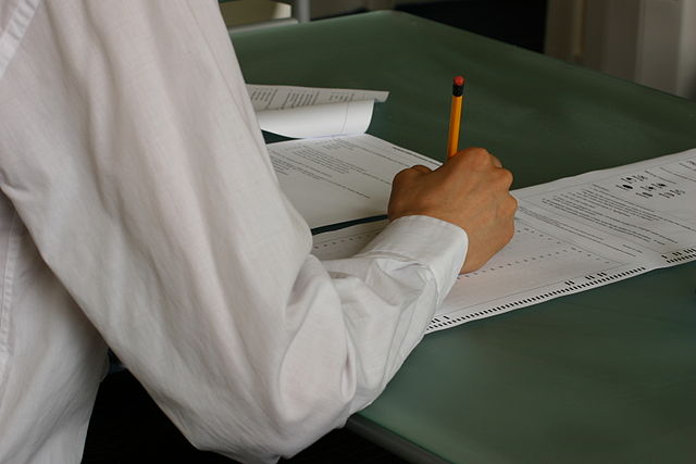Hand-writing-exam-classroom