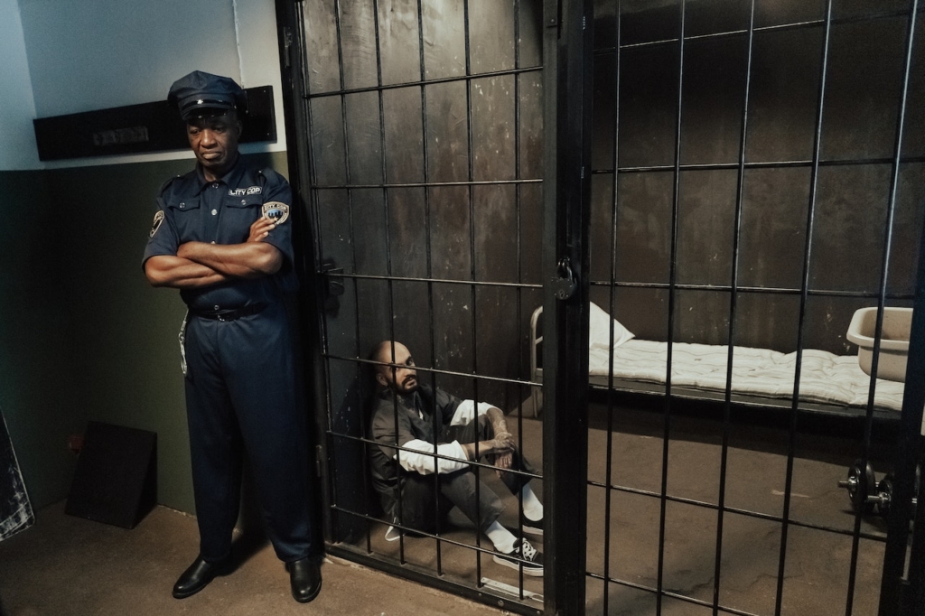 police guarding a prisoner